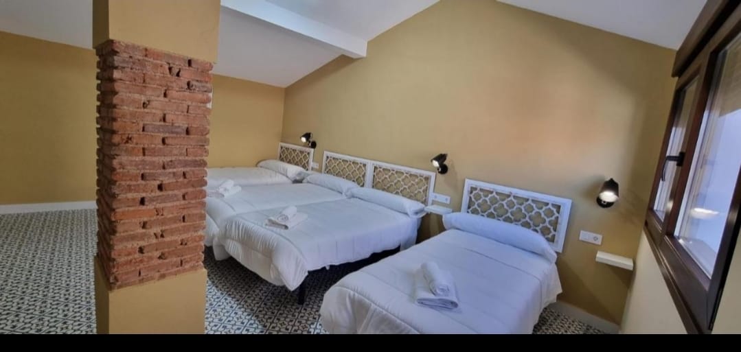 Apartamento alojamiento turístico Cáceres La Morada de Moret dormitorios